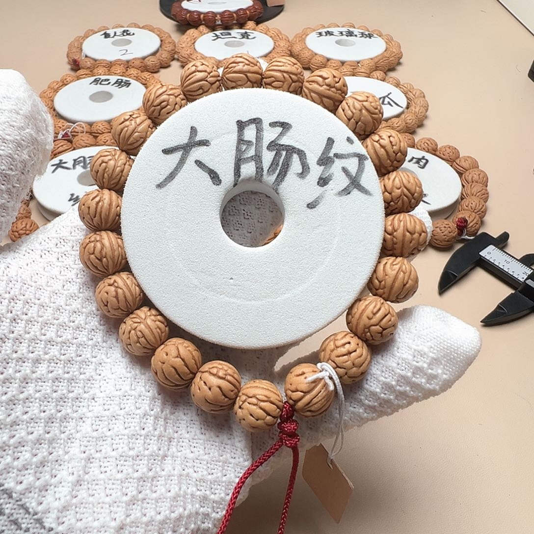 ****荣桃核手串1.2大肠纹27颗