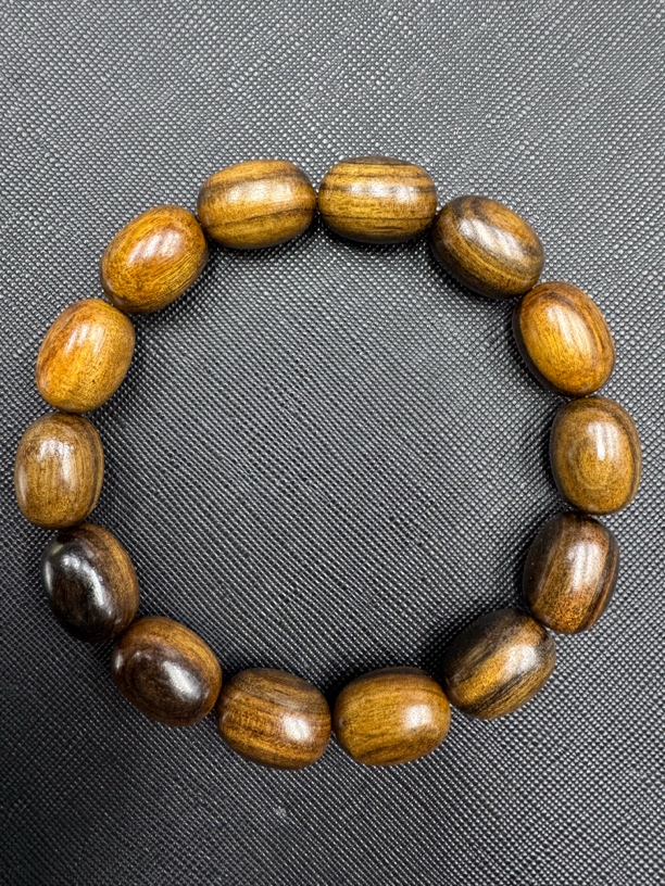 670沉木桶珠手串