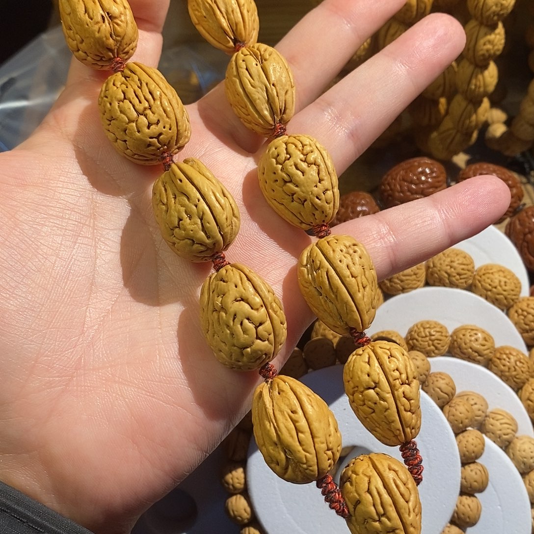 龙***葵手串桃核宽齐瑕疵钱袋子桃核