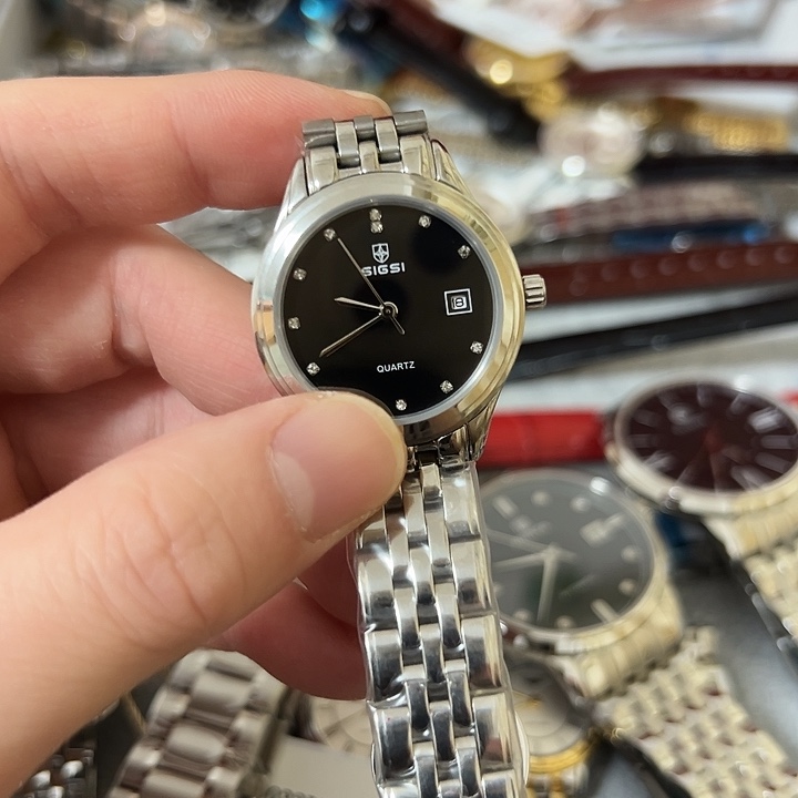 兴***店钢牛皮（革）钢石英机芯