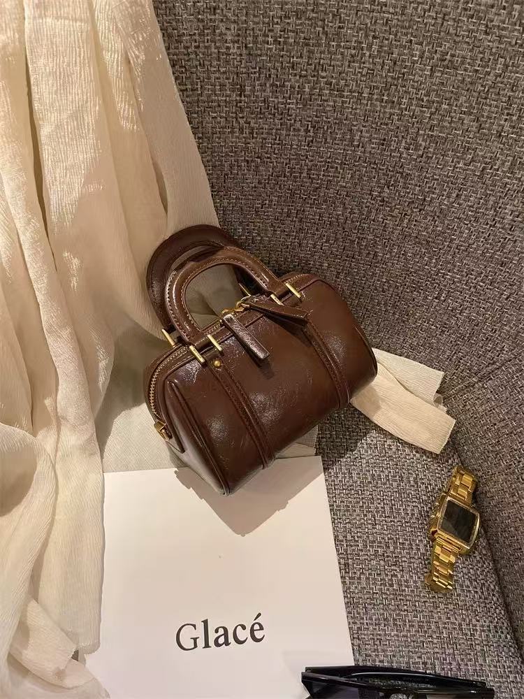 复古软皮摩卡咖啡百搭圆筒包2025新款小众轻奢手提斜跨包包女