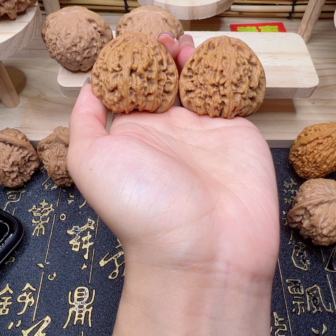 桃核吊坠南疆42.5手把件