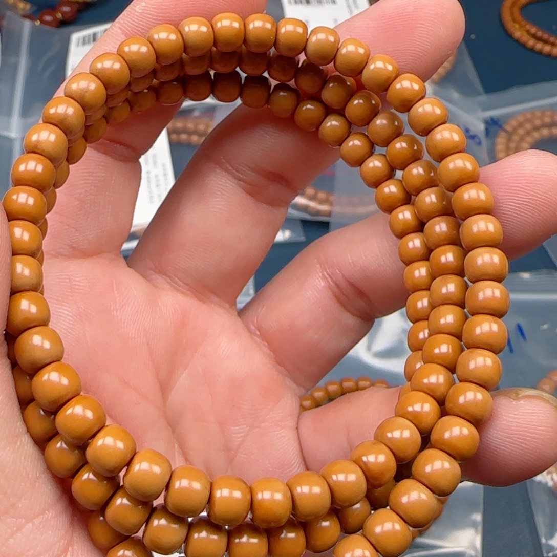 橄榄核手串老挝SS级核尖极限弧尺寸6.6全无白