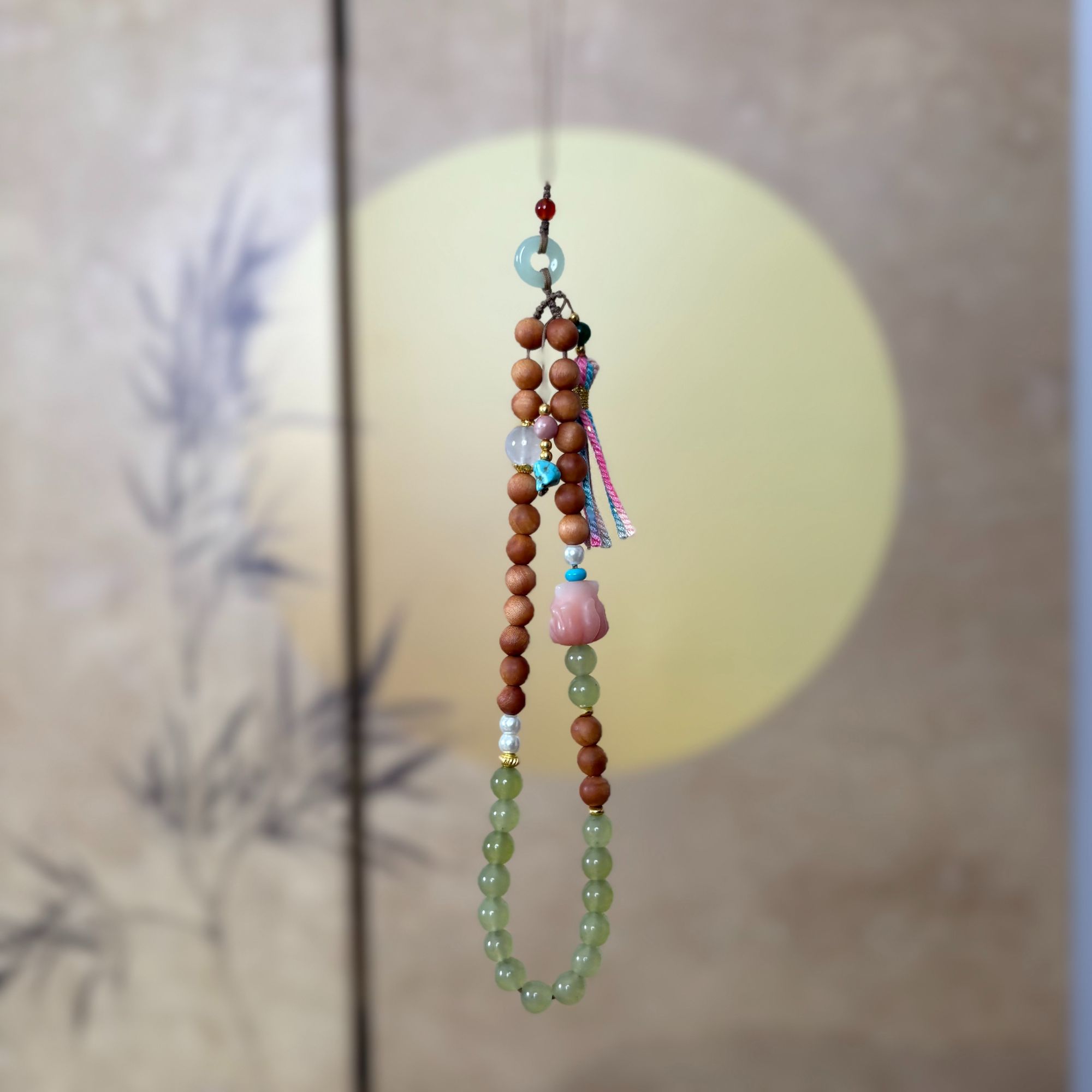 普陀山 凤九芭比檀玉髓挂件