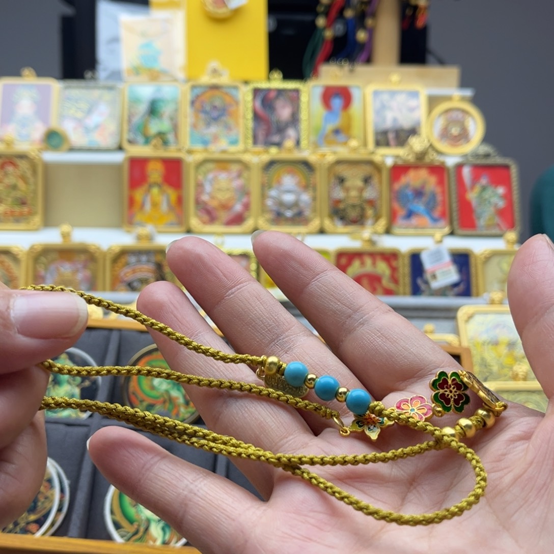 呀***^吊坠唐卡的历史悠久的文化