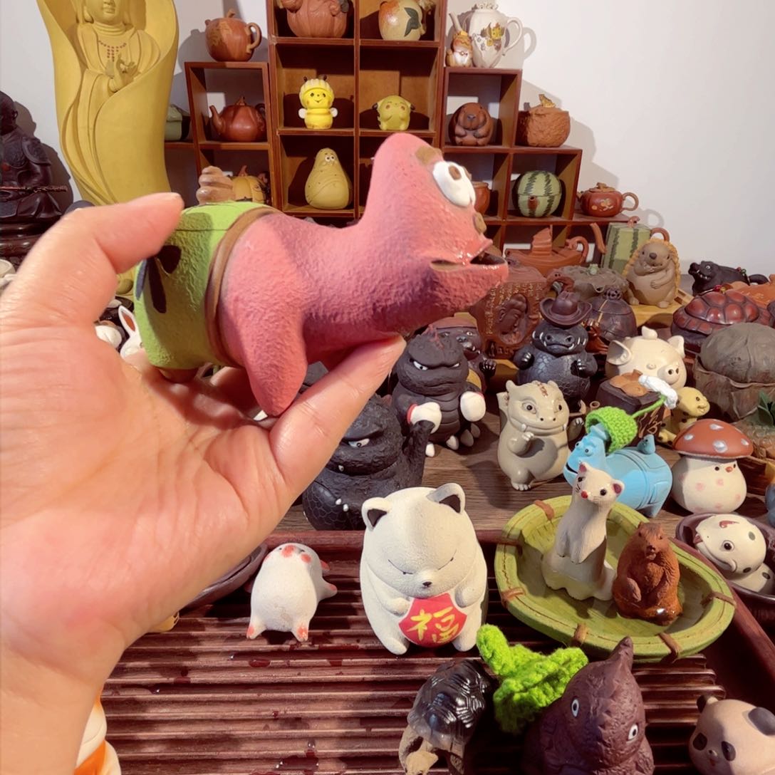 紫砂茶壶我****的纯手工制作过程非常