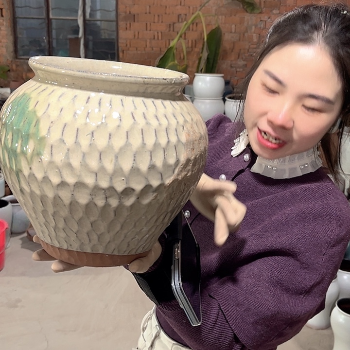 瑕疵口18高23花盆……