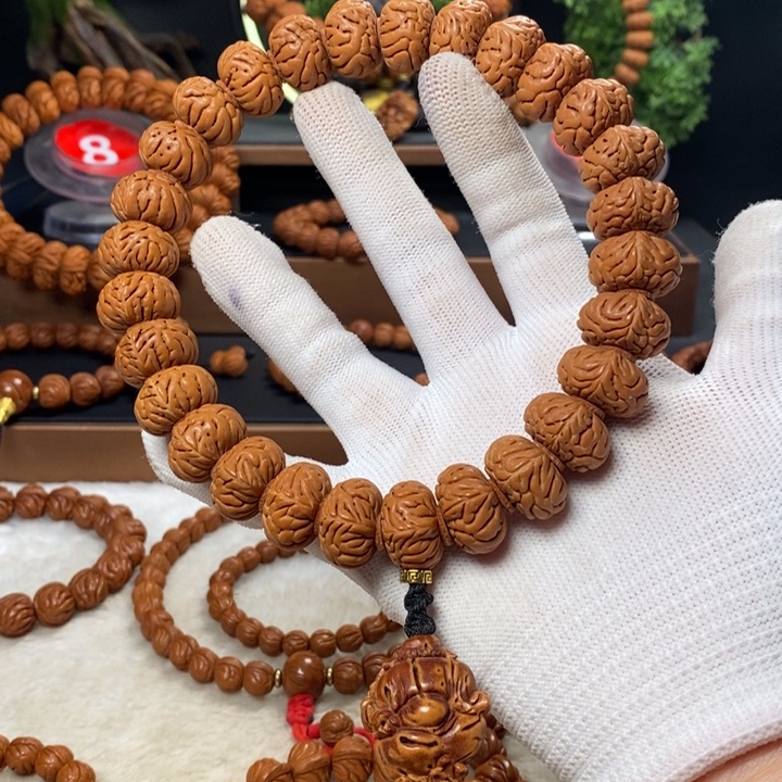 桃核吊坠润****练秦岭龙纹