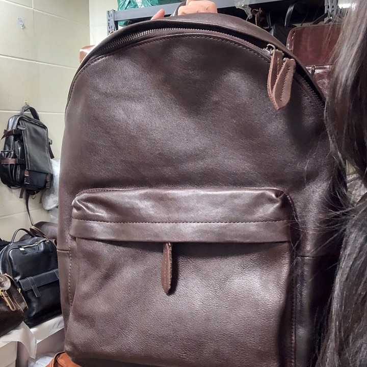 桃***锤头层牛皮包包背包