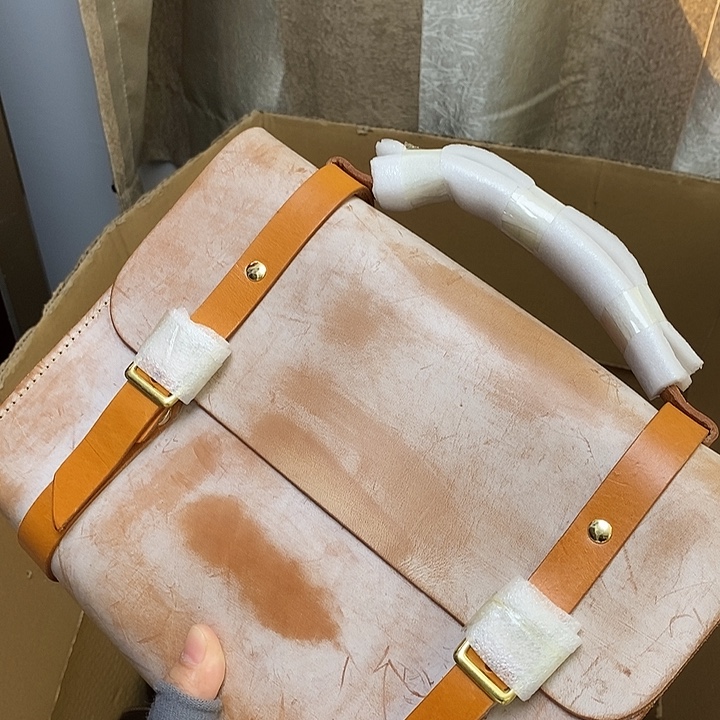 头层牛皮瑕疵单肩包