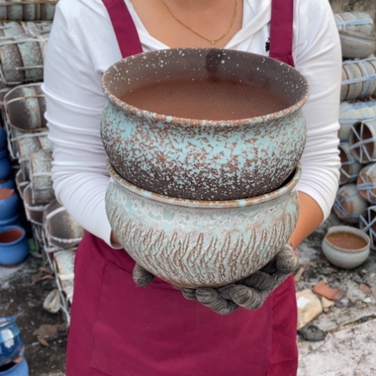 紫砂花盆口20高12瑕疵瑕疵