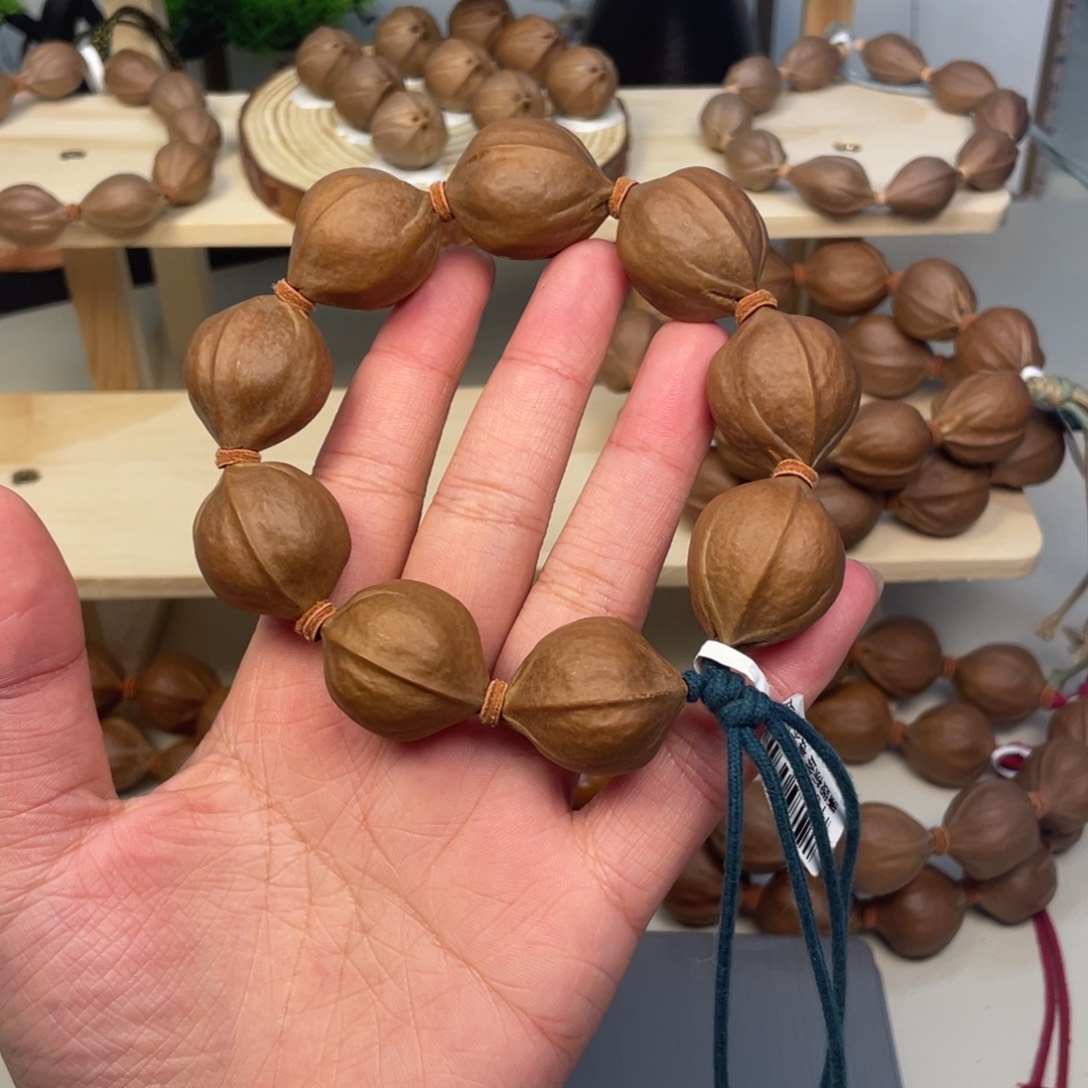 奔***牛手串/手链橄榄核23*28梅林铁核
