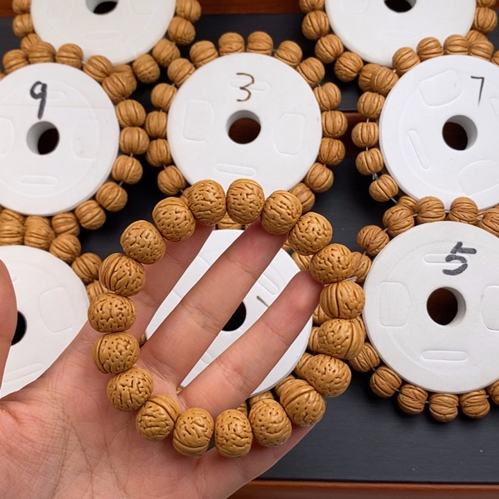 桃核吊坠金丹手串