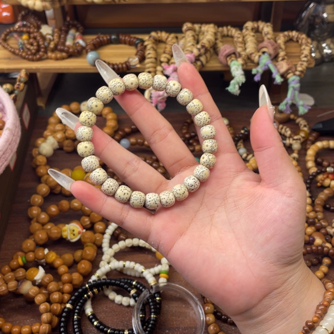 彤***呀星月菩提吊坠文玩手串