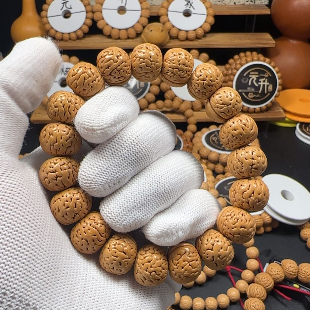 ?****0野苹果桃核手串。