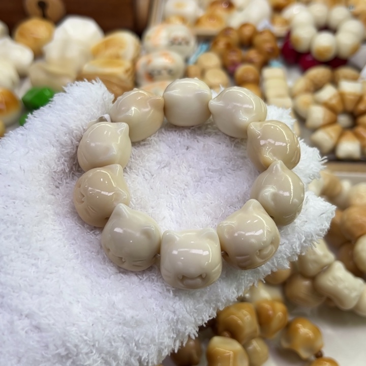 菩提根/象牙果把件96 象牙果原果雕刻溏心虎牙猫