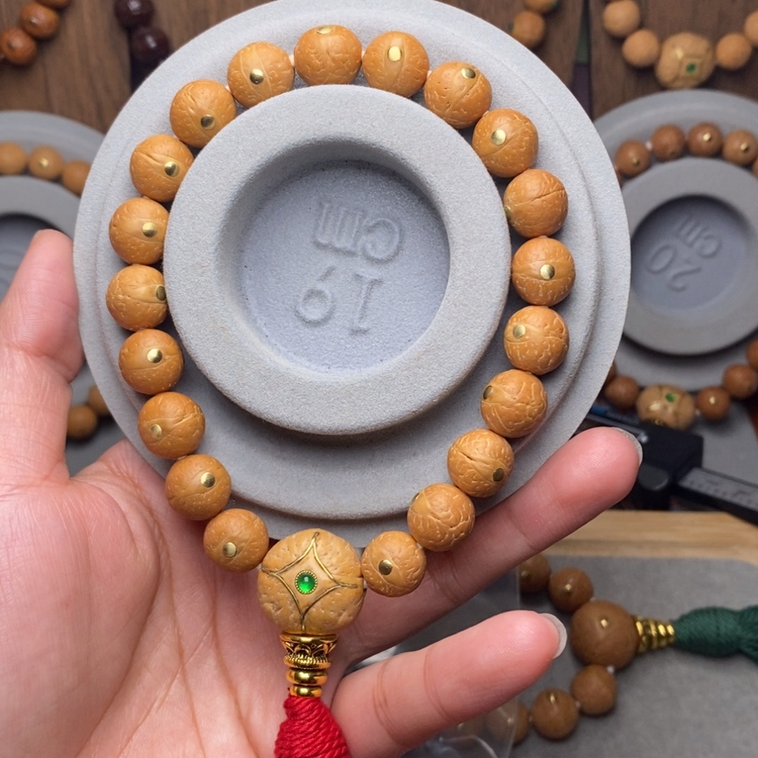 桉***奕凤眼菩提手串11mm➕铜钉
