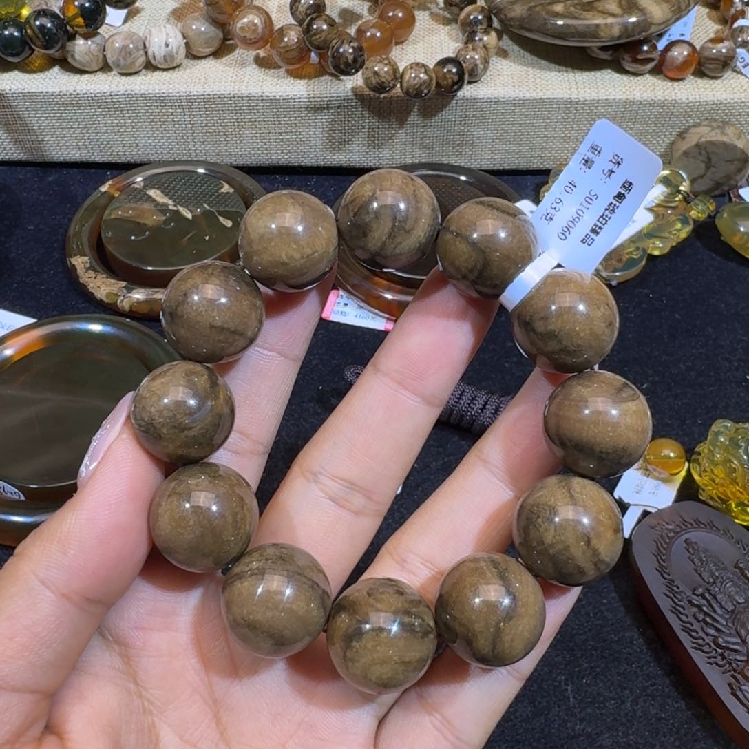 琥珀珠宝奇石未镶嵌素**年根珀手串