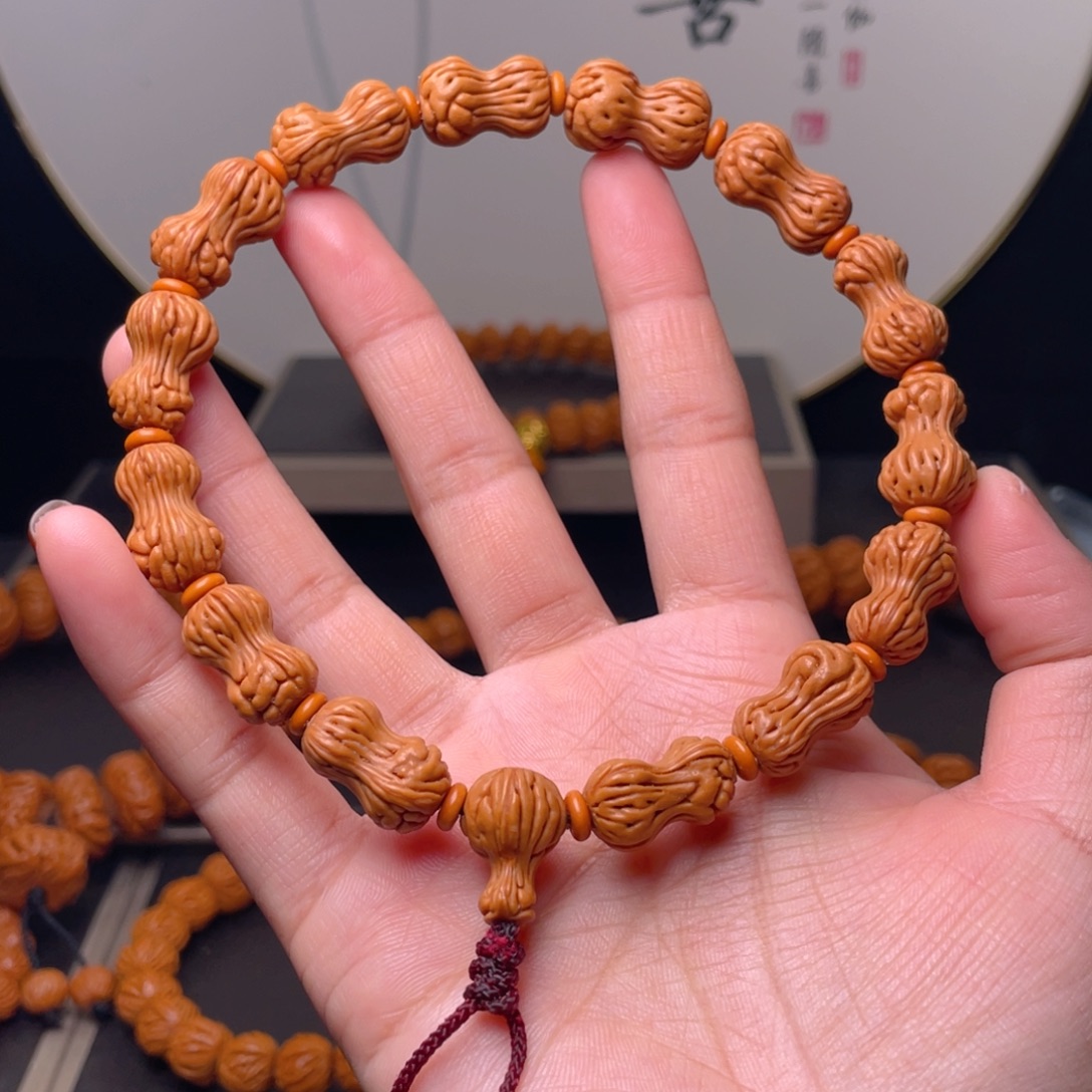 桃核吊坠花生手持