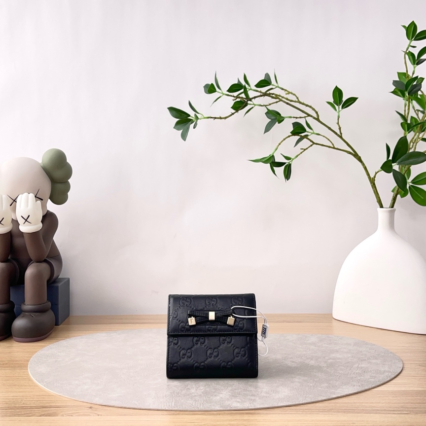 95新 GUCCI/古驰 压纹蝴蝶结短款折叠钱包/0308