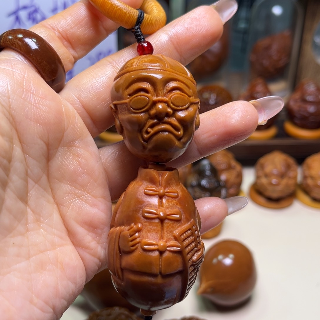橄榄核把件财****）账房先生手把