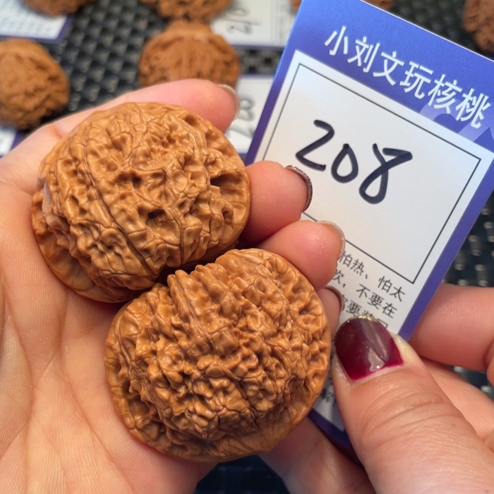 桃核把件45官帽208。。。。。。
