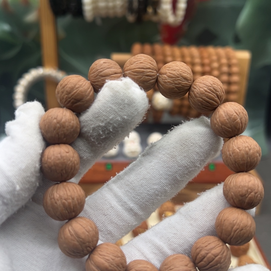 吊坠猴头核桃凤羽