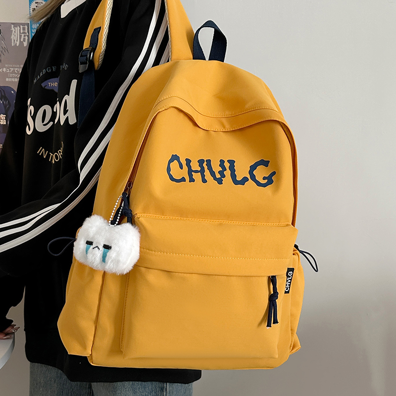 中学生轻便减负少女背包休闲字母百搭高中小学生书包简约双肩包男