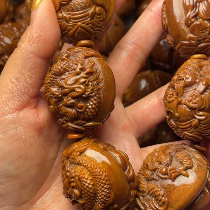 孙***！橄榄核吊坠橄榄核手持