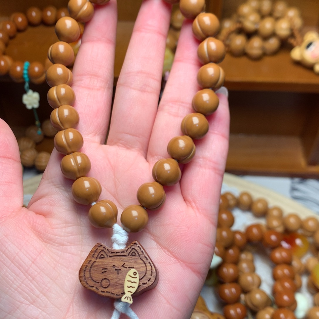 猴头核桃把件10屁桃手持猫吃鱼