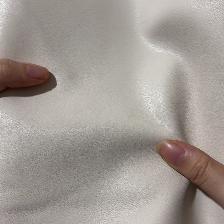 混纺白色布底皮1米。  