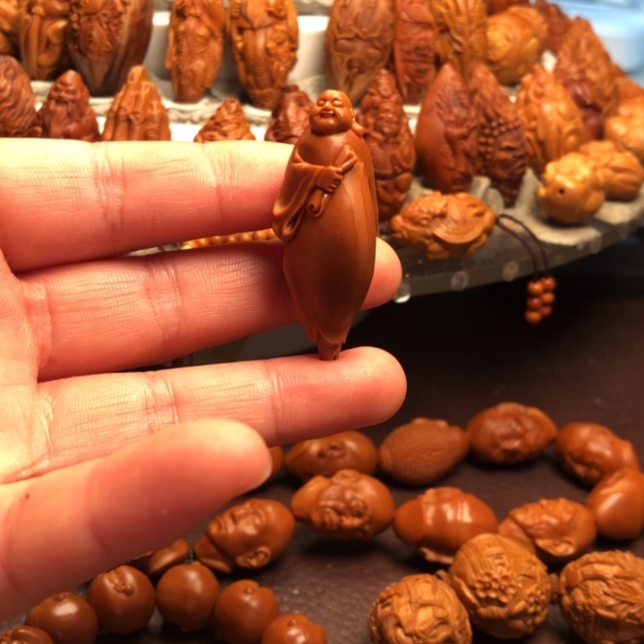 陌***人橄榄核吊坠橄榄核雕刻的单子