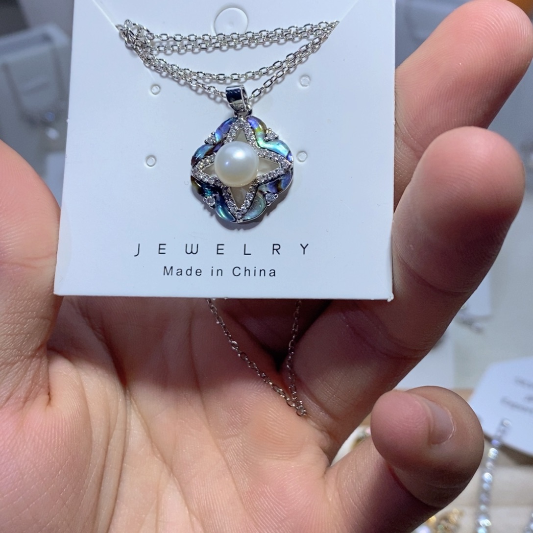 淡水珍珠银S925镶嵌耳饰