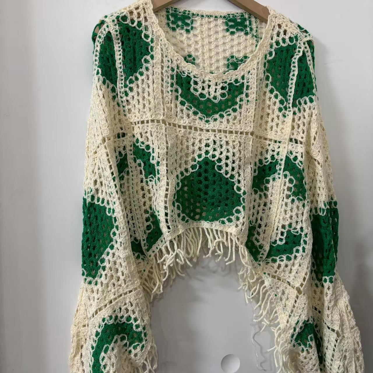 607 时尚长袖圆领撞色镂空流苏短款针织衫罩衫女休闲上衣