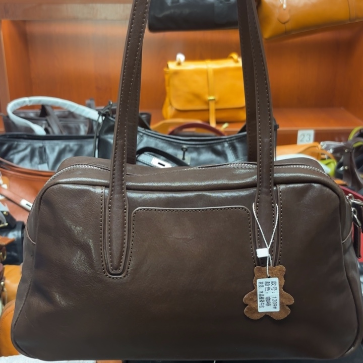 头层牛皮咖啡色水晶植鞣单肩