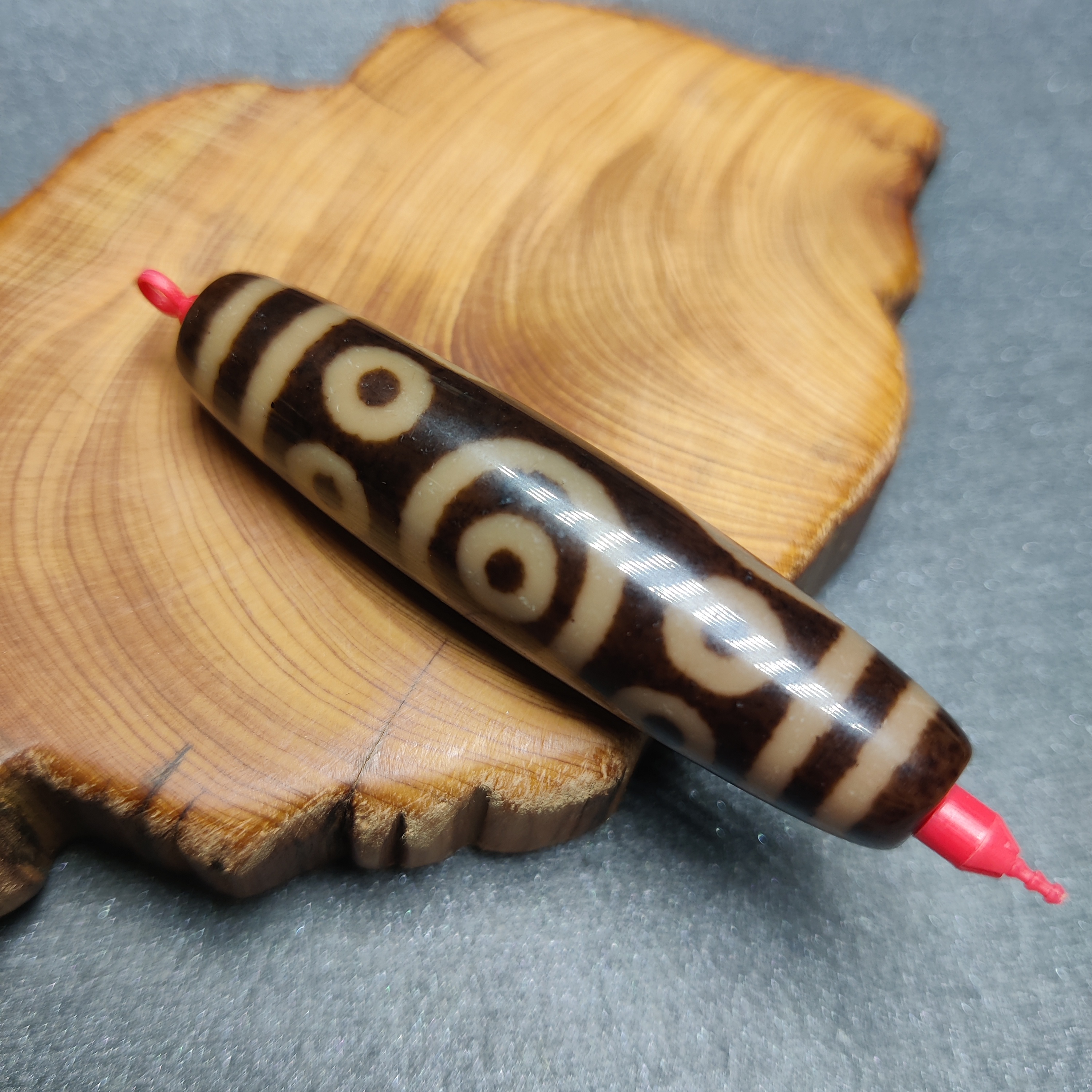 台珠高品黑金十三眼57*13.6玛瑙珠同品包浆感性价比高百搭