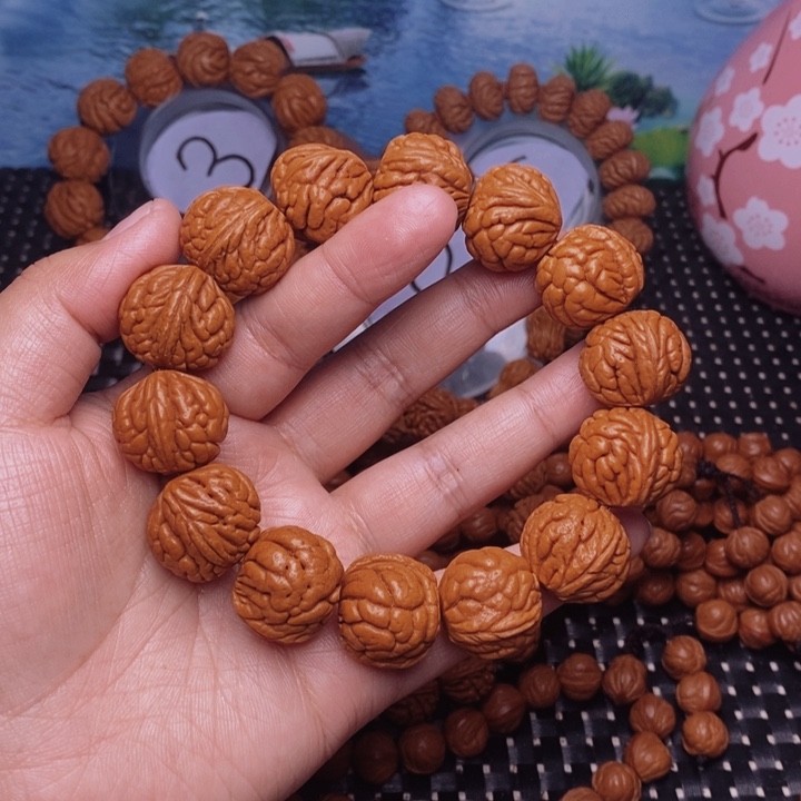 桃核吊坠沉****金桃核手串