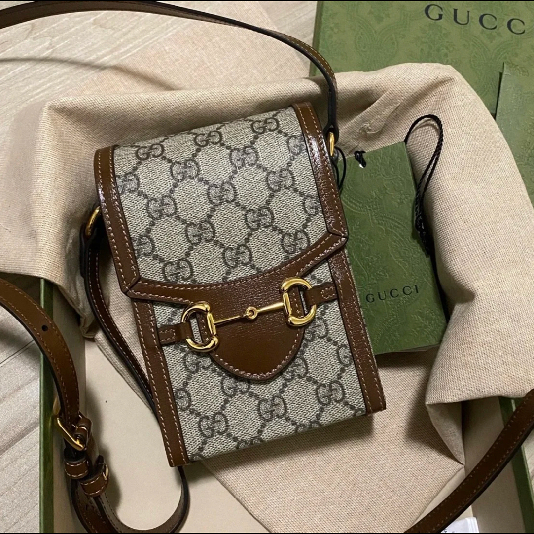 95新 GUCCI/古驰 林纳奢品丨1955竖版手机包棕色老花