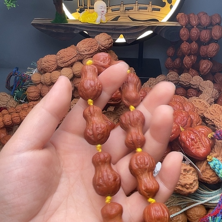 兵***࿐吊坠文玩核桃花生有修