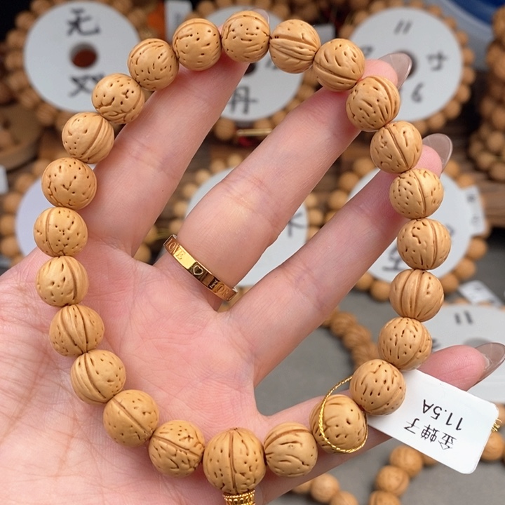 桃核手串金蝉子11.5a抛光板误差 0.5