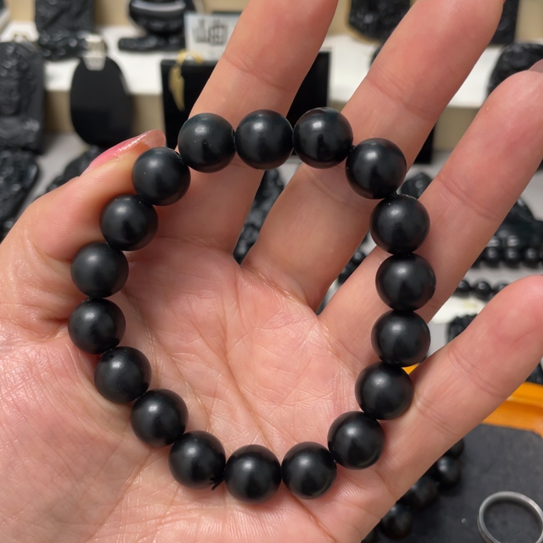 袁***瑟蛇纹石玉未镶嵌手串