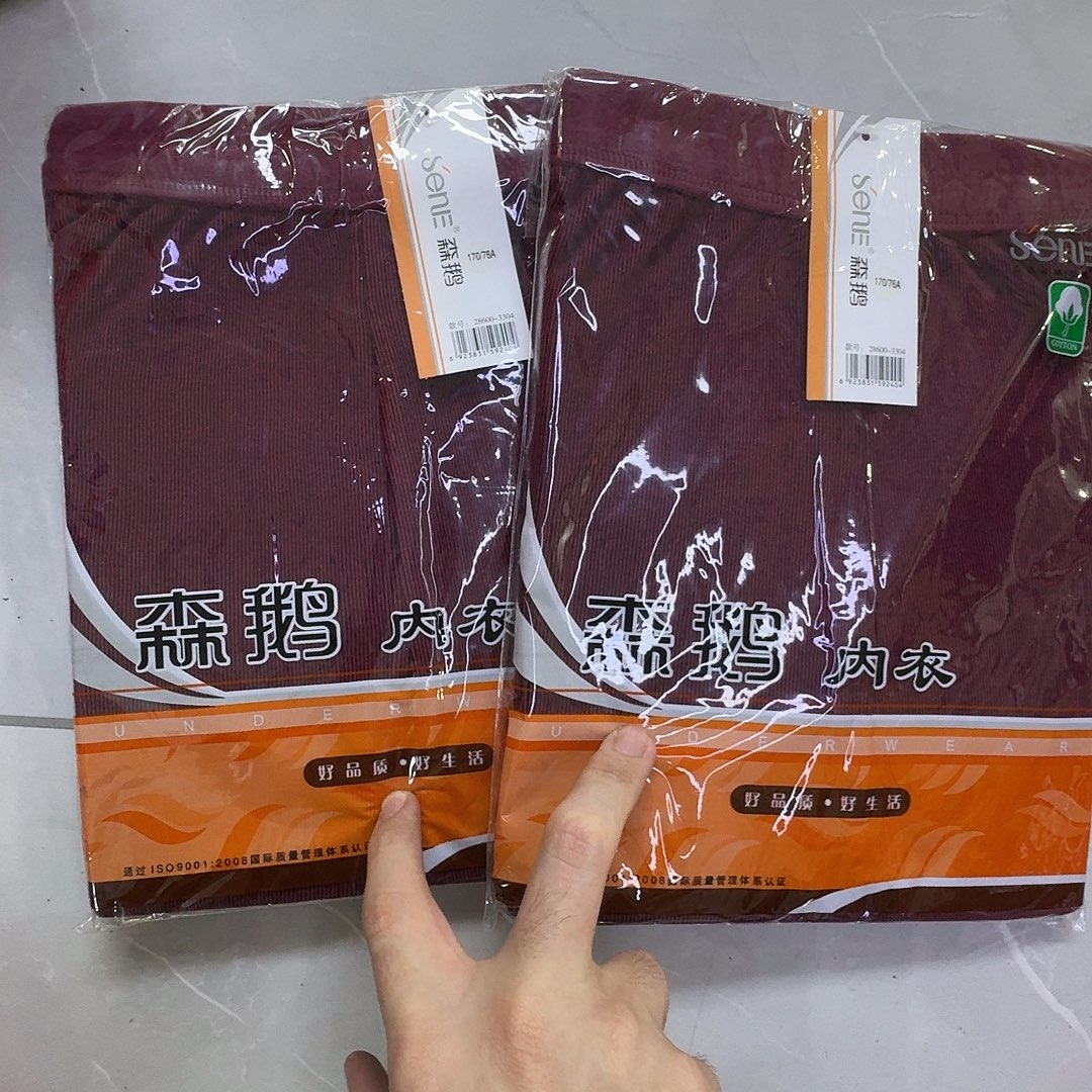 28600枣红女裤子两条170