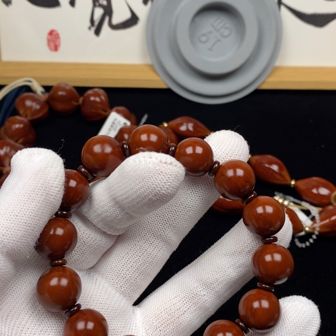 金***蛋橄榄核吊坠橄榄核888888