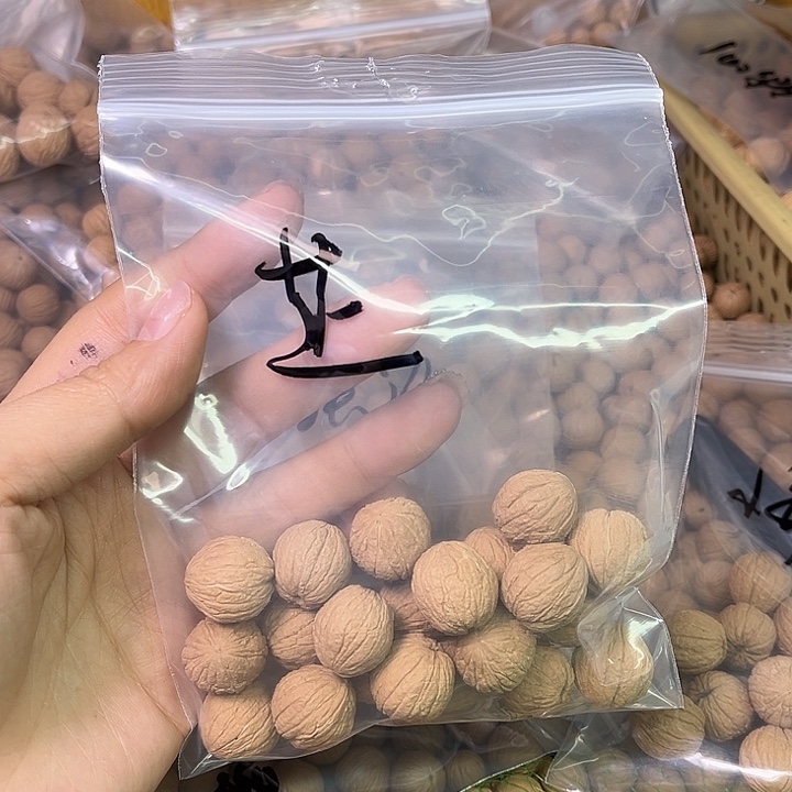 『***』猴头核桃手串凤羽100，蜜桃爱心