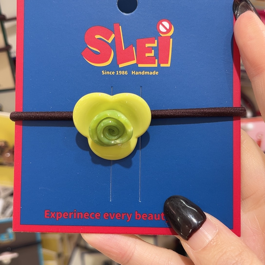 布艺非金属绿花朵皮筋一根