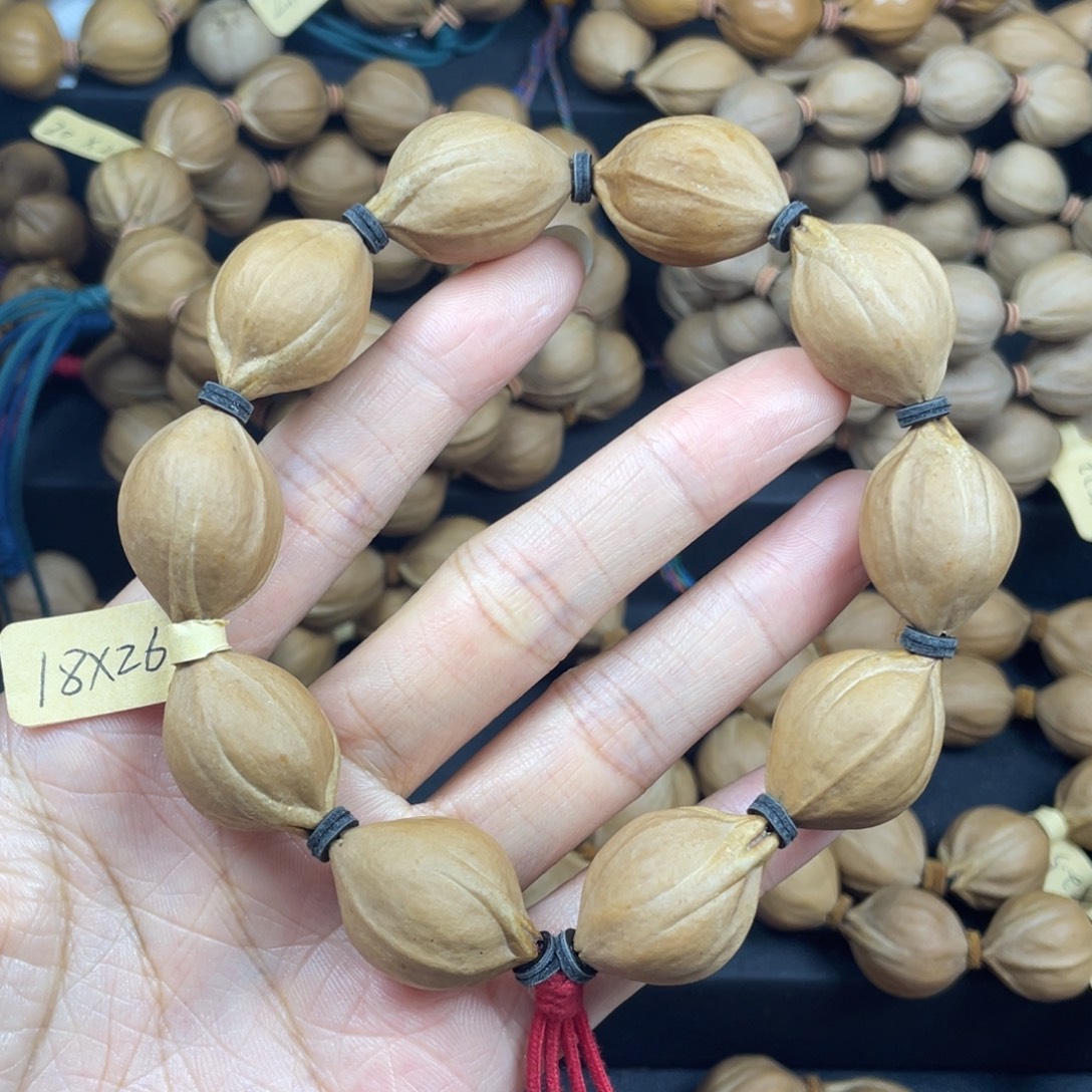 003橄榄核三花18*26