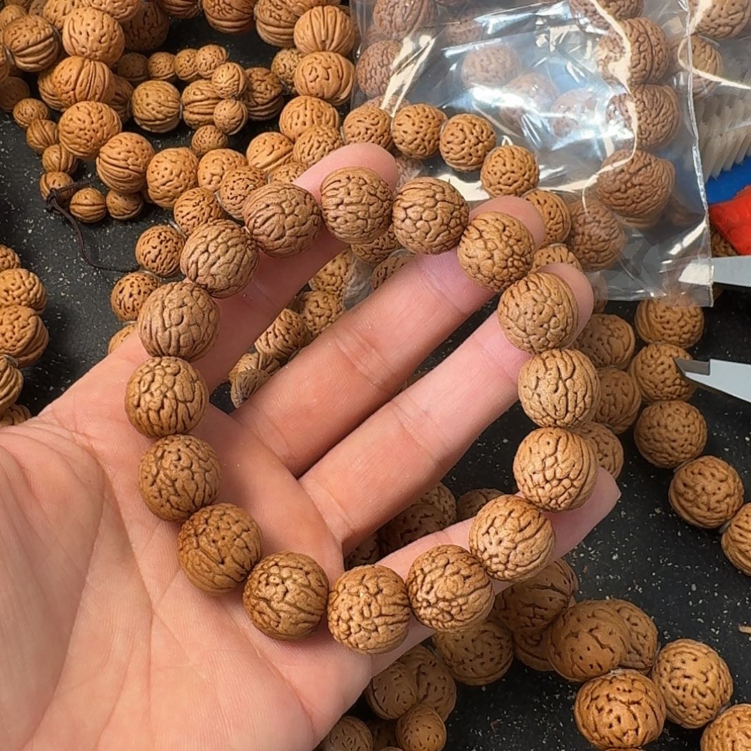 雪***桃核吊坠铁扇手串