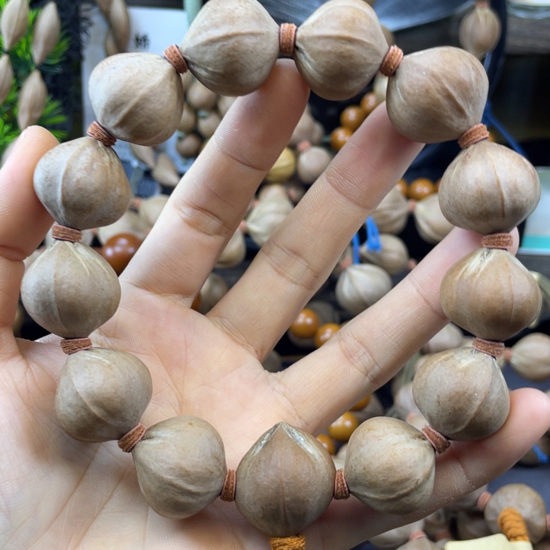 依***花吊坠橄榄核22x22老料