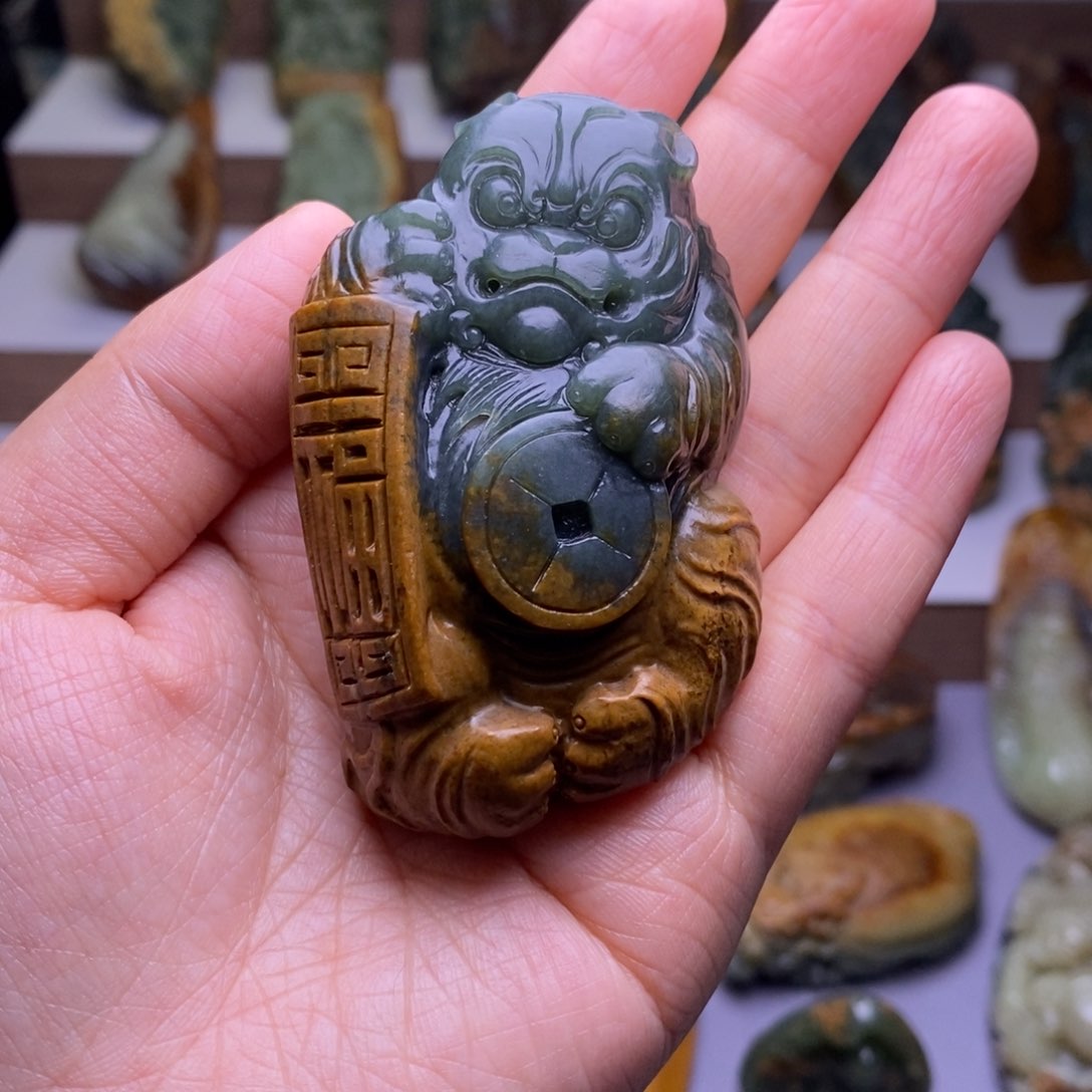 岫岩河磨玉（透闪石质玉）未镶嵌把件火***子