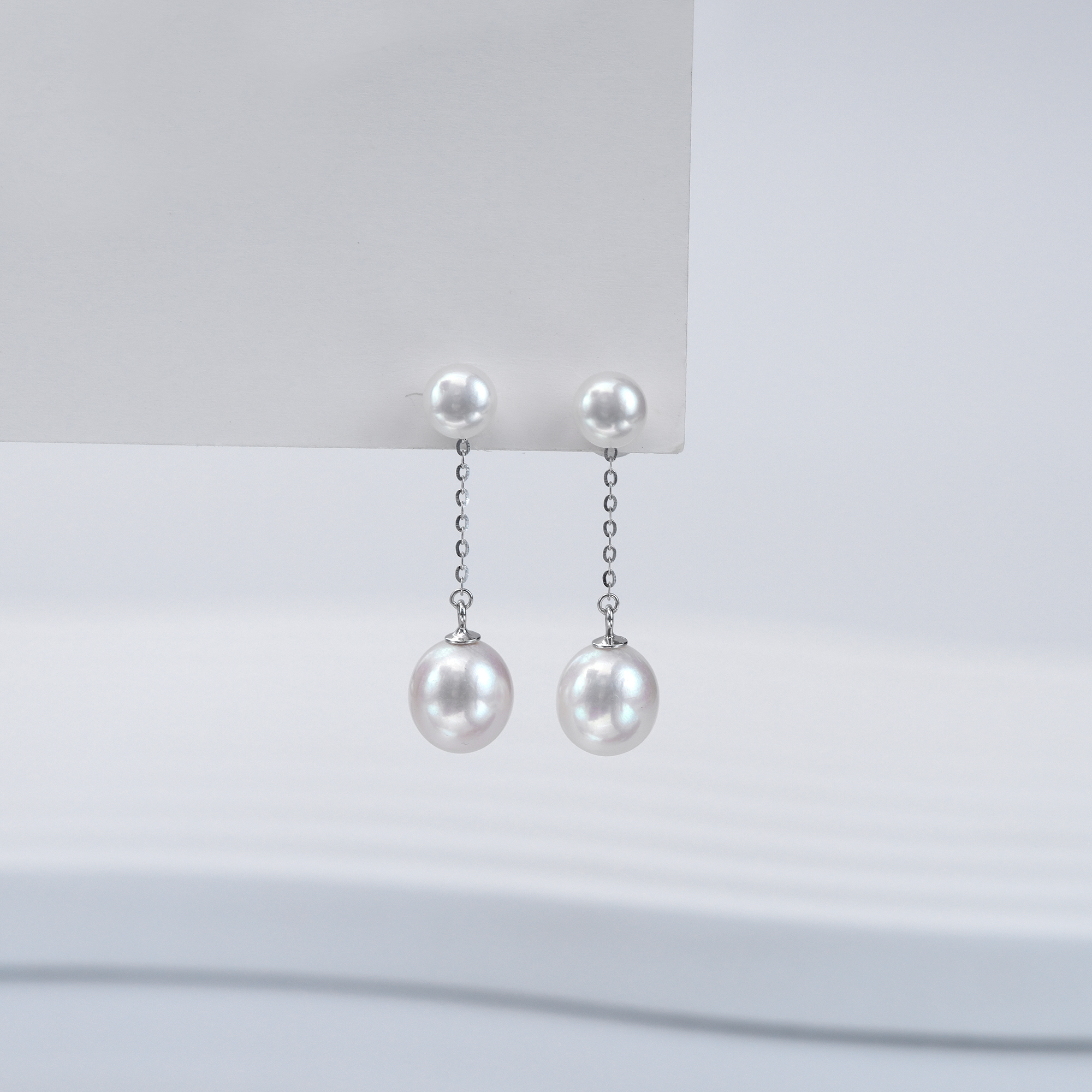 S925银淡水无核珍珠火爆款气质时尚百搭双戴水滴形四珠耳线